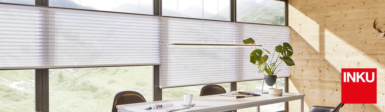 Modern indoor shading with INKU pleated blinds for stylish sun protection in living spaces
