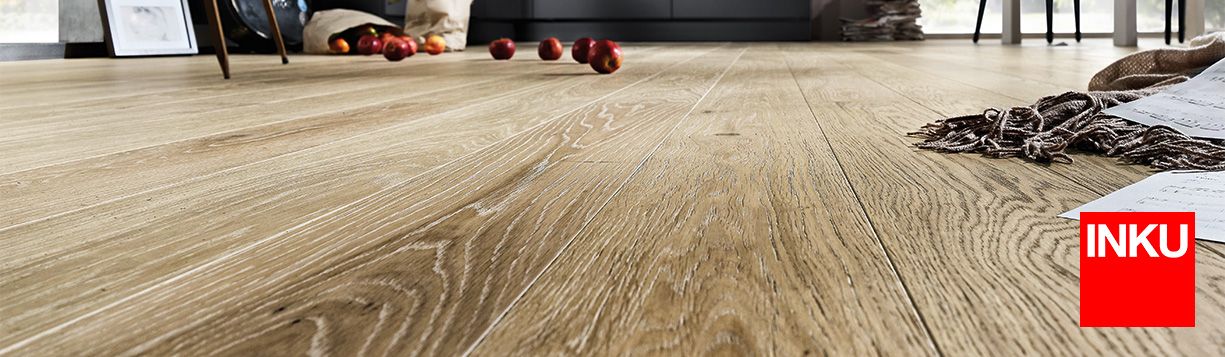 Header image for the INKU Parquet Collection, showcasing modern parquet flooring