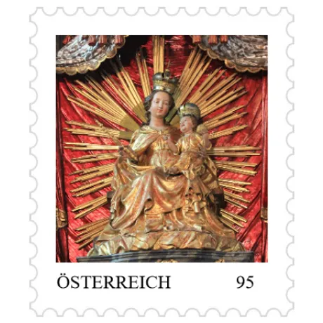 Austrian stamp 95 cents: Golden Madonna and Child statue with radiant red and gold background, Austria 2023.