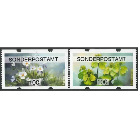 Austrian Post 100 Euro cent stamps: left with white flowers, right with green flowers, marked 'Sonderpostamt'.