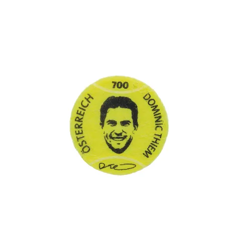 Stamp Dominic Thiem Yellow tennis ball-shaped stamp with the text "Dominic Thiem" and his portrait. Nominal value: 700, Austria, 2023