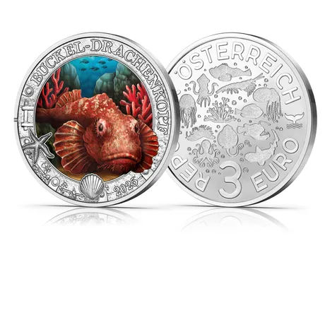 Münze mit Höckel-Drachenkopf-Fisch und Korallen. Rückseite mit Meeresmotiven. Nominale 3 Euro, Österreich, Jahr 2025. Münze mit Höckel-Drachenkopf-Fisch und Korallen. Rückseite mit Meeresmotiven. Nominale 3 Euro, Österreich, Jahr 2025.