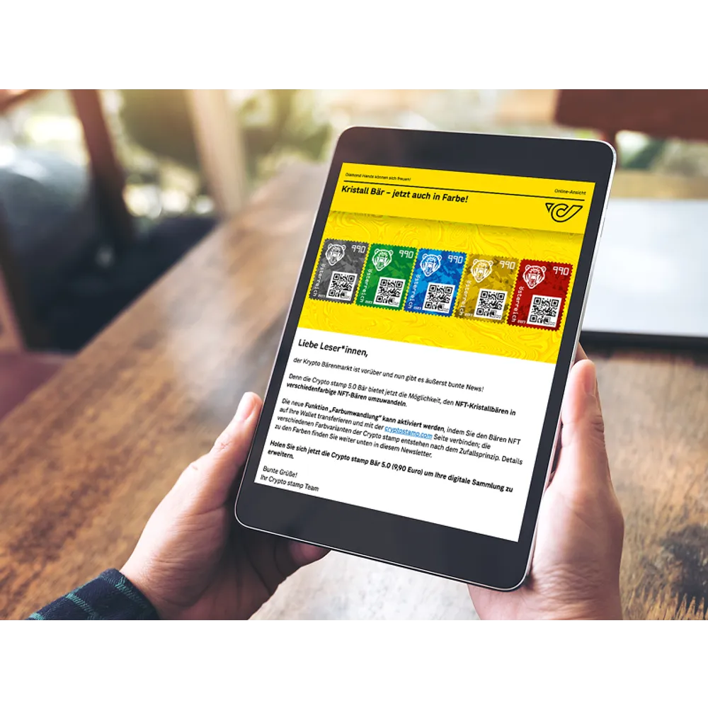 Tablet zeigt die Crypto stamp 5.0 der Österreichischen Post mit bunten Designs, QR-Codes und 'Kristall Bär'-Thema.