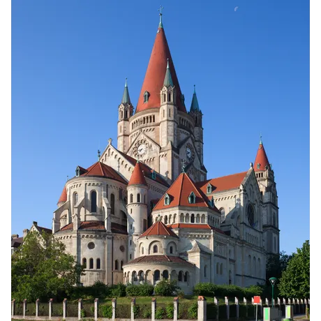 St. Francis of Assisi Church in Vienna with red roofs and blue sky, a potential Austrian Post stamp motif.