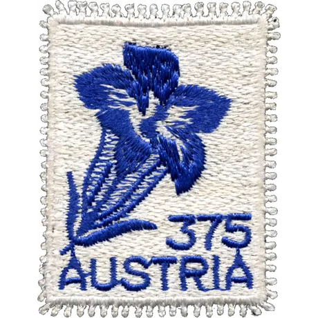 Austrian Post stamp, 3.75 Schilling, embroidered design of a blue gentian flower, Austria text below.