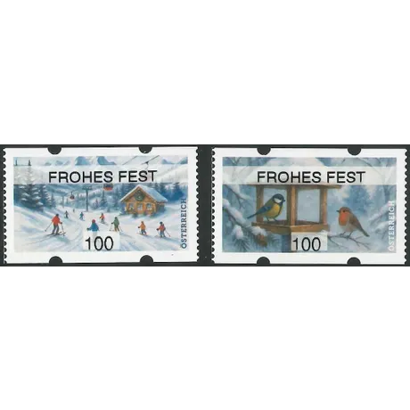 Linke Marke zeigt Skifahrer auf verschneiter Piste vor Berghütte mit Seilbahn im Hintergrund Nominale 100 Rechte Marke zeigt zwei Vögel an Futterhaus im winterlichen Wald Nominale 100