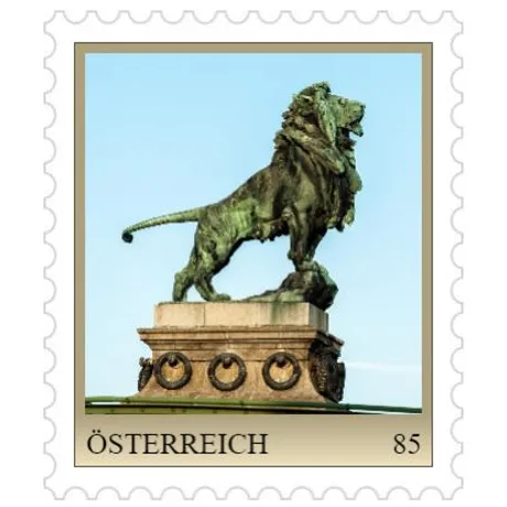 ad0d6f18351696646fb134f3e4d800a0080a6f29.jpg Austrian stamp 2023, nominal value 0.85 euros: bronze lion statue on a pedestal, blue sky background.
