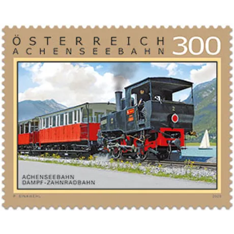 19f04a20bdb97b4d8508ad83207410ea7090082e.jpg Briefmarke Österreich 2022, Nominale 3,00 Euro: Achenseebahn, Dampf-Zahnradbahn mit landschaftlichem Hintergrund.