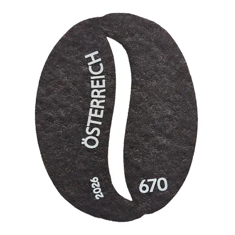 Block Kaffeebohne Dunkelbraune Briefmarke in Form einer Kaffeebohne mit Aufdruck „Österreich“ und Wertangabe 670.