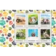 Austrian Post 2023 stamp sheet, 0.95€ each: playful animals including dogs, cats, and a rabbit on colorful paw print background.